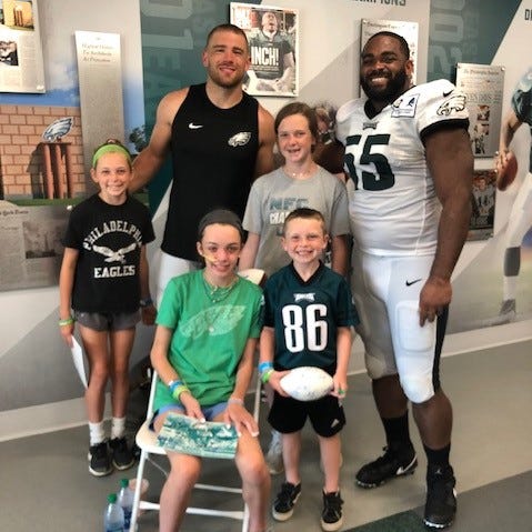 Lily Walker and her family visiting Philadelphia Eagles training camp.