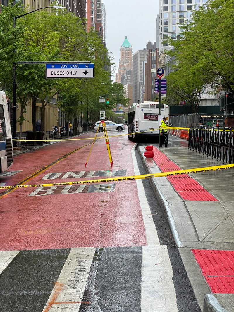 Police closed down streets in Boerum Hill while investigating an incident Sunday afternoon in which a woman was struck by an oncoming B41 bus just after getting off another bus while crossing the street in a two-way bus lane.