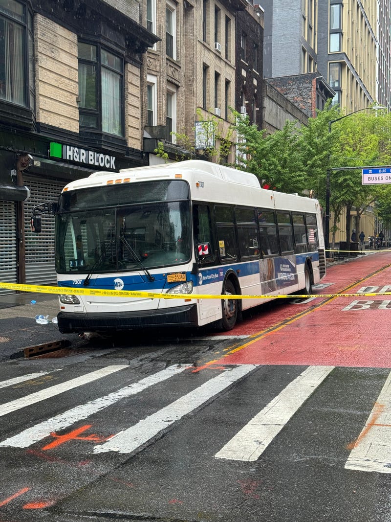 Police closed down streets in Boerum Hill while investigating an incident Sunday afternoon in which a woman was struck by an oncoming B41 bus just after getting off another bus while crossing the street in a two-way bus lane.