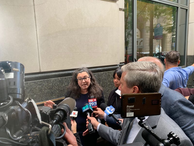 Assistant District Attorney Lyandra Retacco speaks with reporters after the hearing on Tuesday.