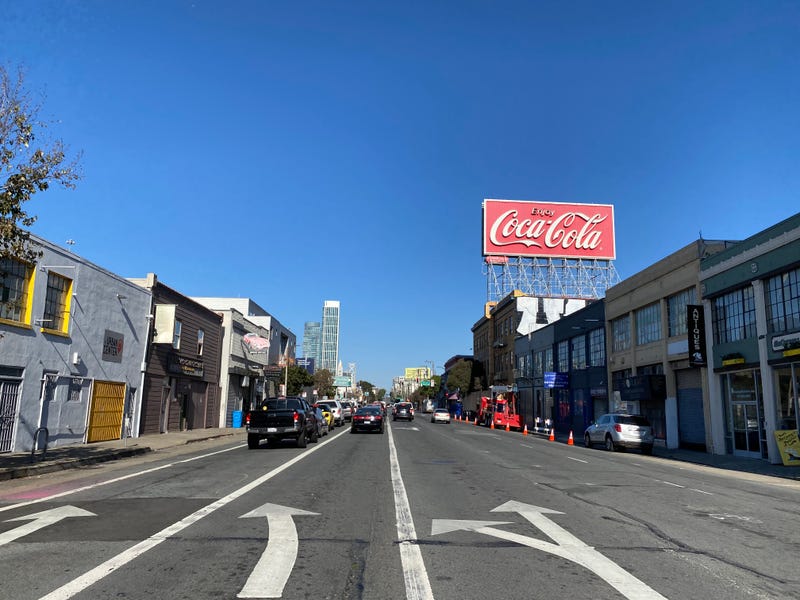 The sign sits atop a building at 701 Bryant St., which a Coca-Cola bottling plant once occupied.