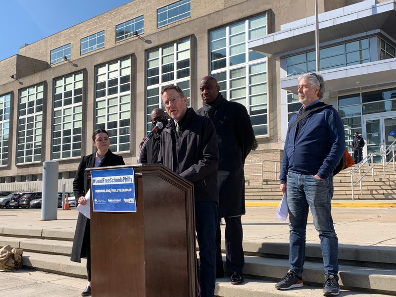 David Masur (podium), executive director of the PennEnvironment Research and Policy Center, calls out the school district's severely high levels of lead in its drinking water outlets at a press conference on Feb. 16, 2022.