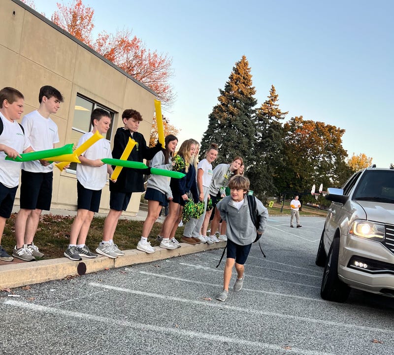 Fellow students welcome classmates back to their school community on Oct. 21, 2024.