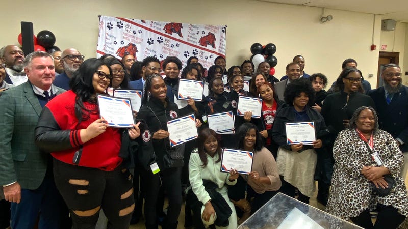 Students pose with certificates from teaching pre-apprenticeship program at Parkway West High School.