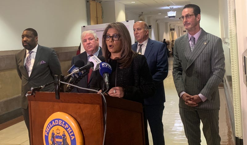Five Philadelphia city council members in front of a podium