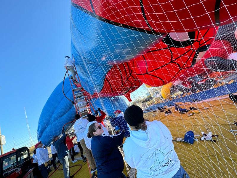 Balloon handlers help the Macy's team test the newly-unveiled balloons ahead of the 2024 Macy's Thanksgiving Day Parade.