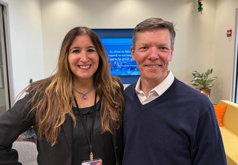 Gina Crash with Catholic Charities Executive Director Dave Kinkopf 