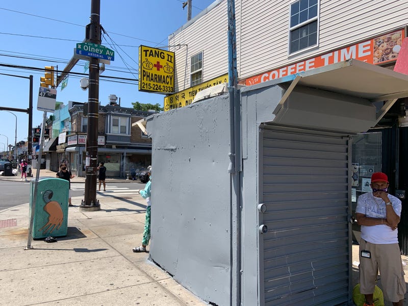 The newsstand on 5th Street and Olney Avenue is painted gray after vandals spray-painted graffiti associated with a white supremacist group over a George Floyd mural that was painted on its side.
