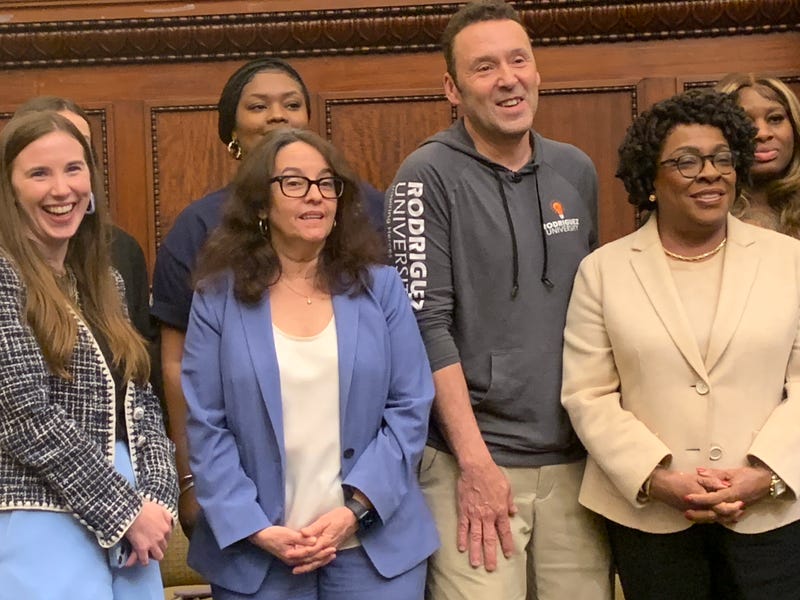 Front row, from left: Gianna Grossmann, senior director of workforce development; Alba Martinez, director of commerce; Sheila Ireland, president of Opportunities Industrialization Center. Back row, from left: Trenay Dantzler, Lou Rodriguez.