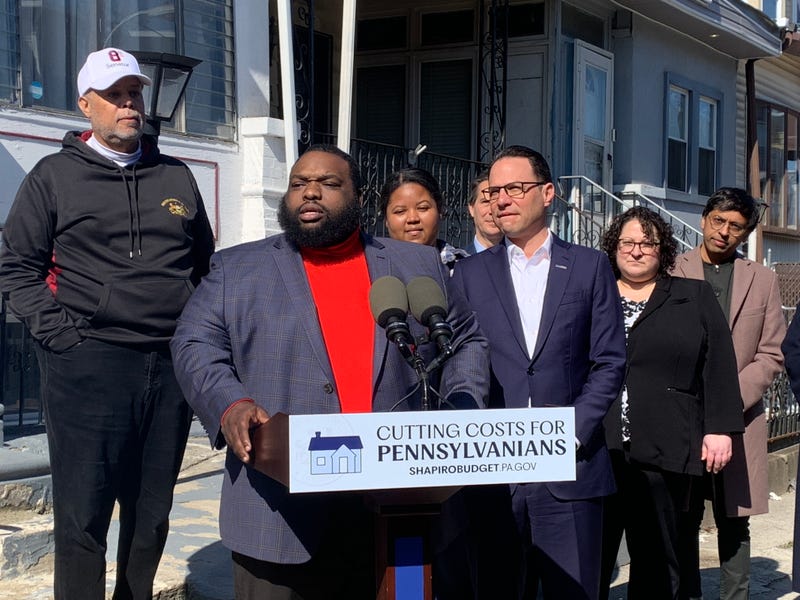 from left, State Sen. Anthony Williams, State rep. Jordan Harris, Dominique Young, Shapiro, Emily Schapiraa of Philadelphia’s Built to Last home repair program and State Sen. Nikil Saval, who created the Whole Home Repair Program.