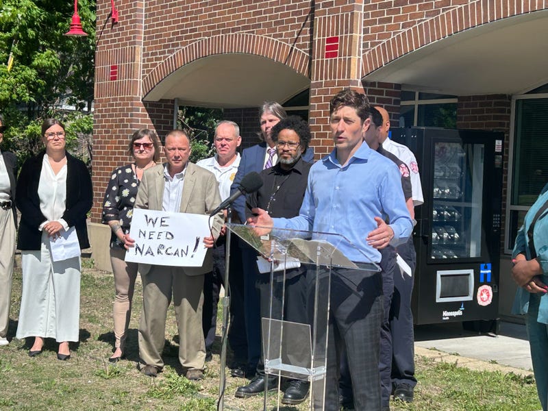 Minneapolis Mayor Jacob Frey debuts the second Narcan vending machine in Minneapolis (background).