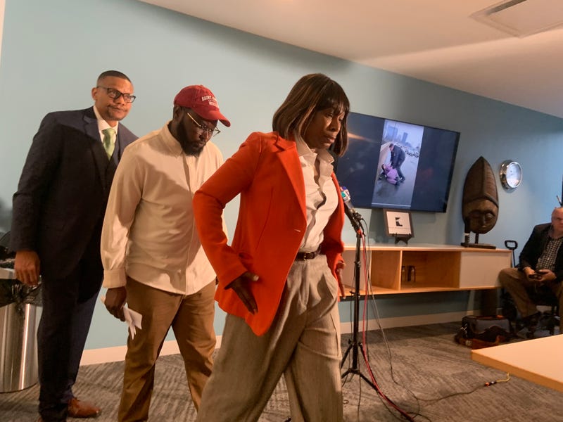 Philadelphia Office of LGBT Affairs Executive Director Celena Morrison (right) and Darius McLean (center), chief operating officer at William Way LGBT Community Center, announced the beginning of a civil action resulting from their arrest during a traffic stop on Saturday.