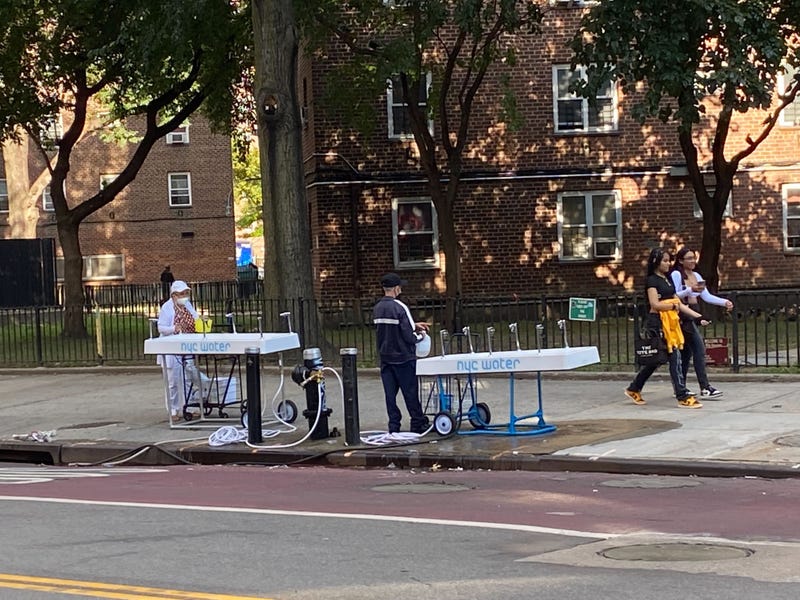 Portable water fountains provided by the city outside the Jacob Riis Houses after a positive arsenic test prevented residents from drinking tap water.