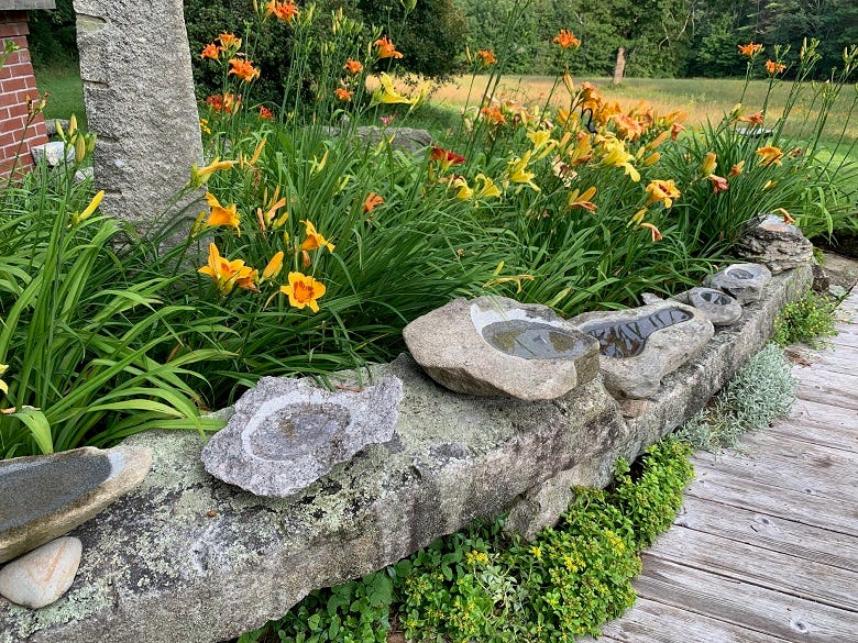 Our friend Patrick, who's a stone mason, hand carves these beautiful bird baths