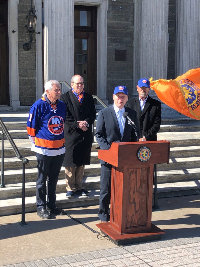 Bobby Nystrom, Butch Goring, Isles Owner Jon Ledecky, and Nassau County Executive Bruce Blakeman at the ceremony honoring Clark Gillies.