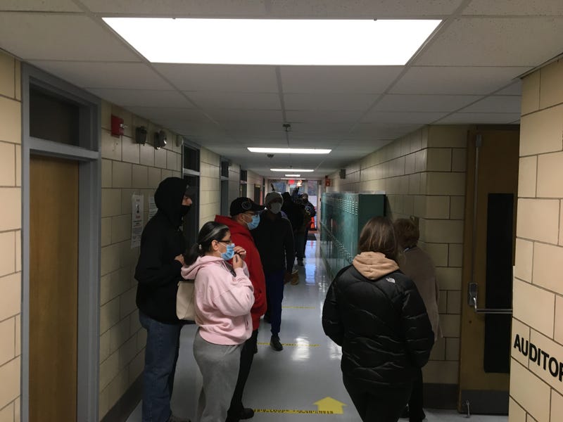 Voters wait in line at JFK Elementary School in Windsor