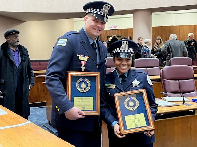 police officers with awards