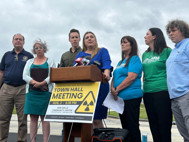 State Rep. Tricia Byrnes, center, speaks at a press conference in Weldon Spring about radiologically contaminated sites in the St. Louis region. To her left stands U.S. Sen. Josh Hawley, who promised to introduce legislation to compensate residents who became ill because of radiation exposure.