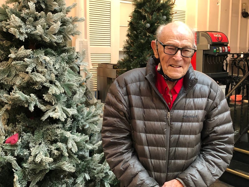 Joe Greenberg, the World War II veteran who worked at The Little Tavern in Geneva for over 50 years doing everything from coordinating inventory, to roaming the store in costumes, to being the staff photographer for special events.