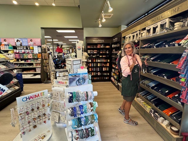 Employee Kathy LeFredo works in the candle & jewelry section of Oswald's Pharmacy