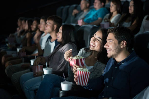 Young couple at the movies 