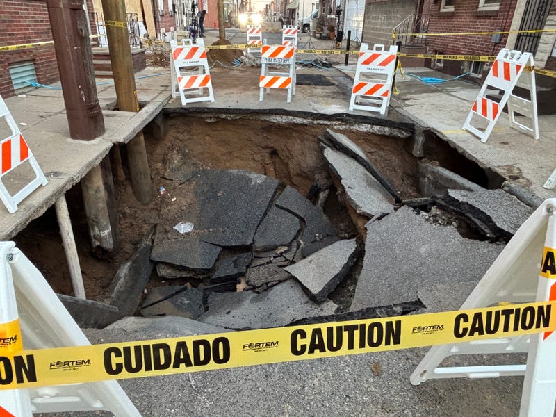 Water main break creates massive sinkhole in Port Richmond