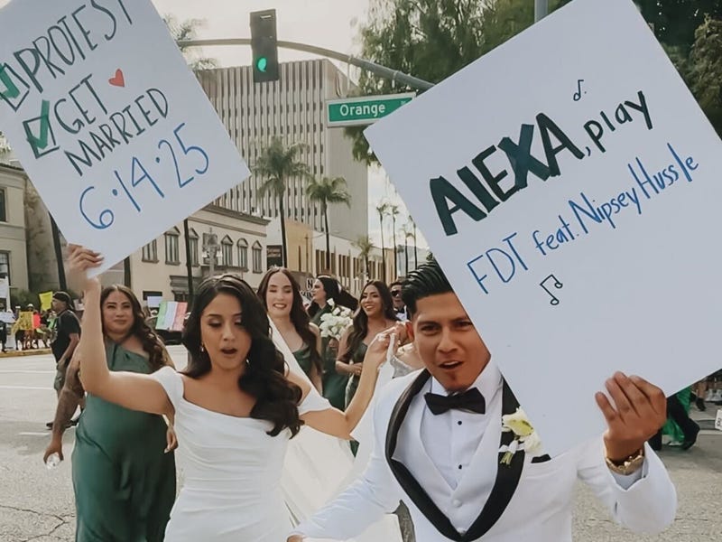 couple with protest signs