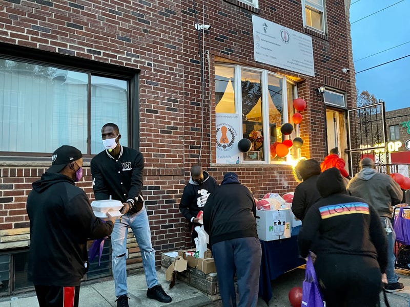 Tyrique Glasgow, who leads the Young Chances Foundation in Southwest Philadelphia, giving away free food in Grays Ferry.