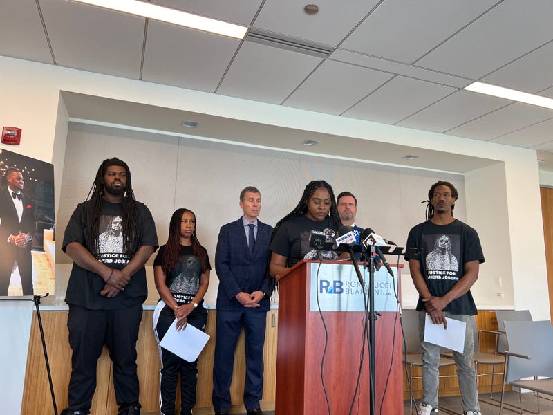 Family of Abnerd Joseph speak at a press conference Monday, nearly one year after Joseph was shot and killed. The family members demanded answers in his death, which they said has still been classified as an open investigation.
