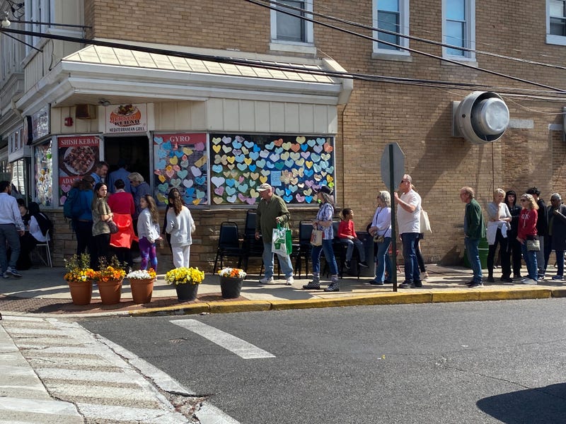 Dozens line up outside Jersey Kebab on Sunday, March 30, 2025 to celebrate the owner's return.