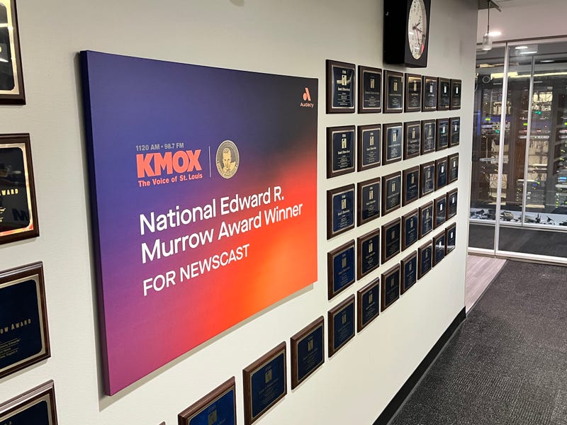 The wall of previous year's awards displayed in the KMOX newsroom