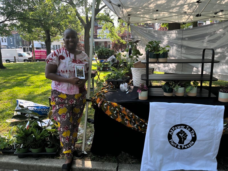Cherron Perry-Thomas, co-owner of Plant & People in West Philadelphia, joined thousands at the Juneteenth parade and festival at Malcolm X Park, June 18, 2023.