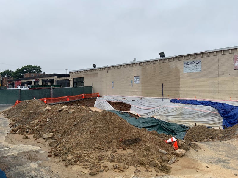 The ground has been cleared at the Fifth and Spring Garden streets strip mall to make way for a multi-use apartment building project. 
