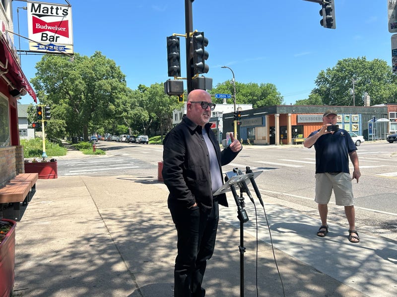Television celebrity and chef Andrew Zimmern standing outside Minneapolis' famous Matt's Bar. Their "Jucy Lucy" will be a featured food item at this year's "Taste of Minnesota" in downtown Minneapolis July 5 and 6.