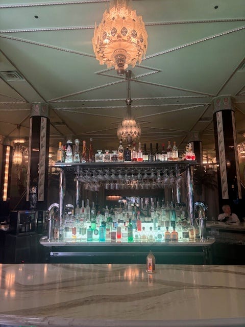 The vibrant Fhima's in downtown Minneapolis, where French-Moroccan food meets opulent chandeliers, glimmering bronze lanterns, and the heavily protected art deco space that used to be the city's famous "Forum Cafeteria."