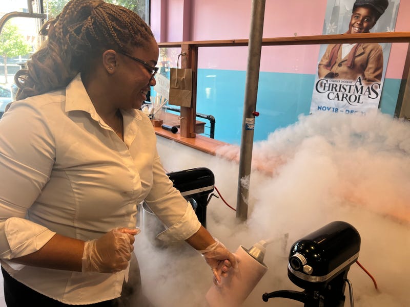 Kamillah Lucas uses liquid nitrogen to make ice cream at Nitro Nostalgia in Bronzeville. Lucas operates the shop with her dad Garland Lucas. 