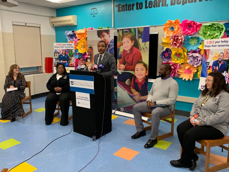Philadelphia Schools Superintendent Tony Watlington (center) speaks at a news conference on early teacher recruitment at Bethune Elementary School on Tuesday.