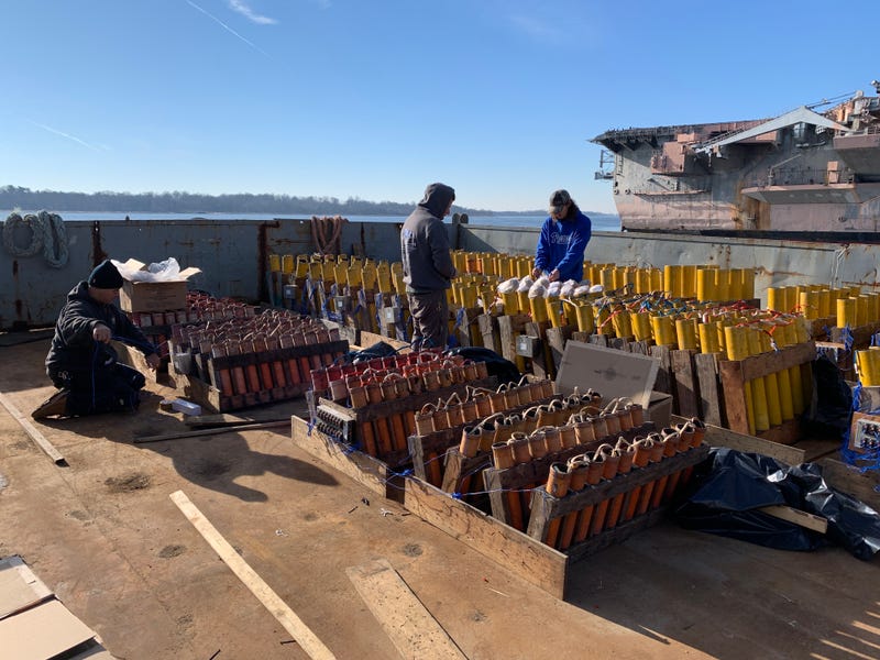 Crews at the Navy Yard on Dec. 29, 2022, set up the mortars and connect the wires from the explosives to the computer that will set them off, all ahead of two 12-minute fireworks shows at Penn's Landing.