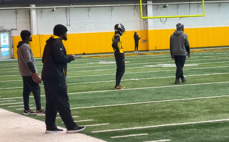 Mike Tomlin with Cory Trice in the back
