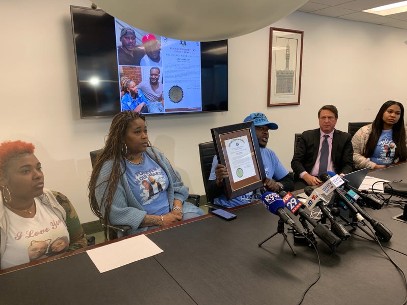From left: Dawn Fobbs (in blue), Eric Coates, and lawyer Eric Zajac.