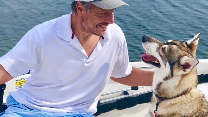 PICS: Woof! Scruffy Andrew Cuomo with his dog in boat off LI, 1st photos since leaving office