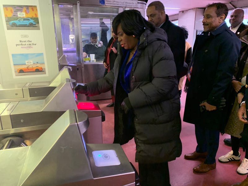 Mayor Cherelle Parker swipes card to hop on SEPTA.