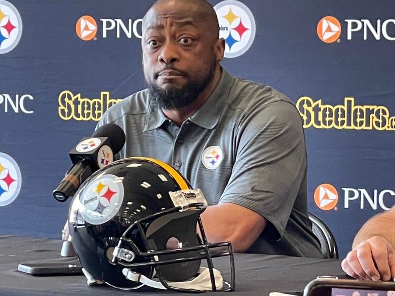 Mike Tomlin at a podium