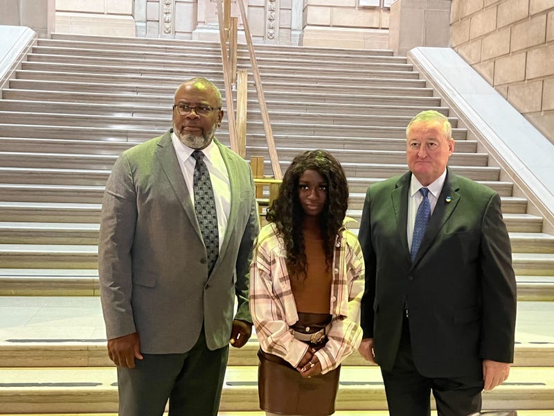 From left: Free Library of Philadelphia Director Kelly Richards, youth poet laureate Telicia Darius and Philadelphia Mayor Jim Kenney.