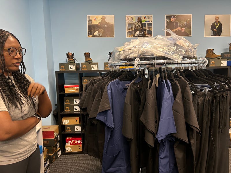 Small Sums Executive Director Leika Pierre-Louis shows how they try to keep people that are homeless outfitted with work gear, training, and transportation they need to get and keep their jobs.