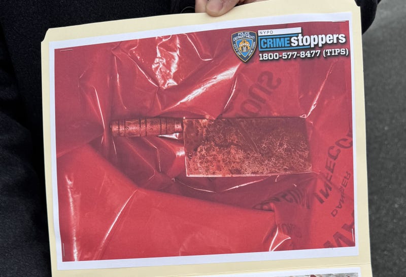 The suspect was armed with a large meat cleaver, police said