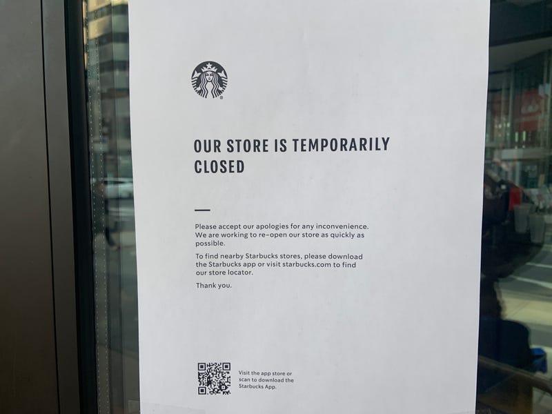 A sign notifying customers that a Center City Starbucks location is closed due to a one-day protest by union members.