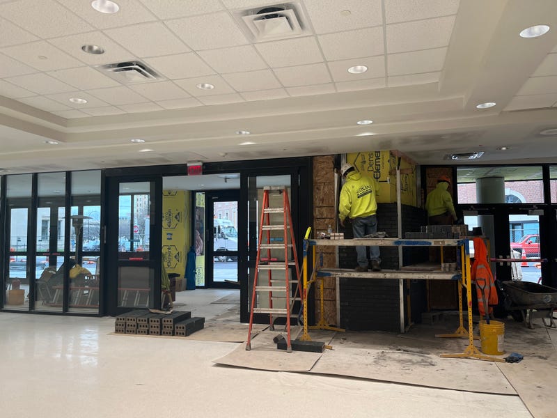 Laying down new black brick near the new entrance of the Buffalo Niagara Convention Center. 12/1/2020 Buffalo, N.Y.