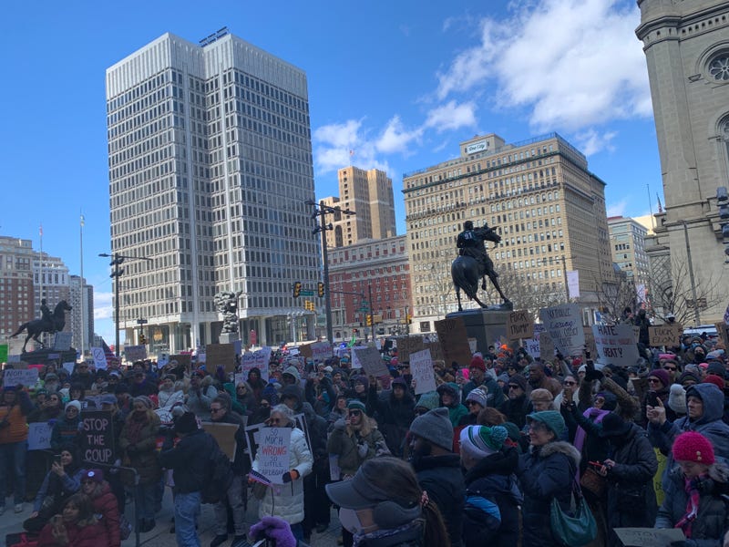 About 1,000 people gathered at City Hall on Presidents Day, Feb. 17, 2025, before marching down the Benjamin Franklin Parkway to the Art Museum to protest recent actions taken by the Trump administration.