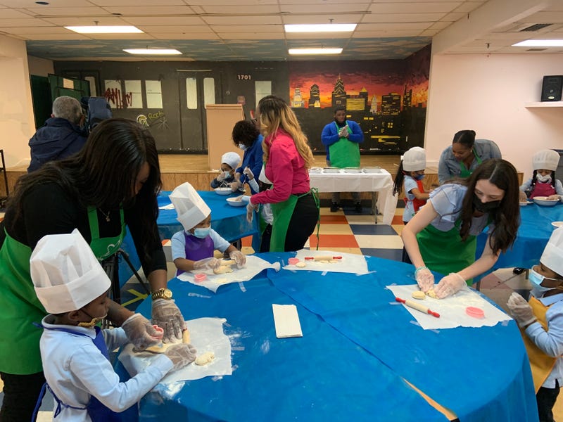 Children rolling dough at the R.W. Brown Boys and Girls Club in North Philadelphia. 